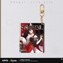Load image into Gallery viewer, Honkai: Star Rail Train Travel Journal Themed Acrylic Keychain Preorder
